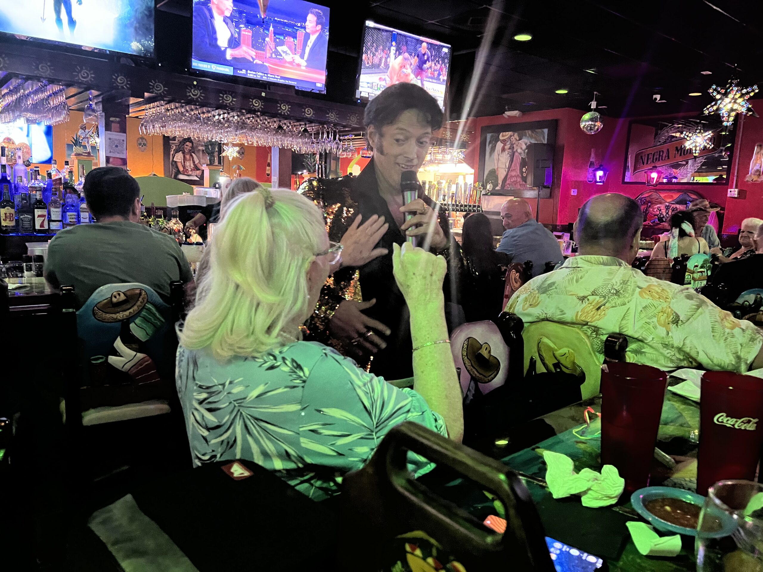 Randy Elvis flirting with Marion at Fresh Guacamole in Ormond Beach, FL.